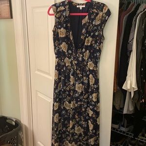 Long sleeveless summer dress with drawstring tie at waist